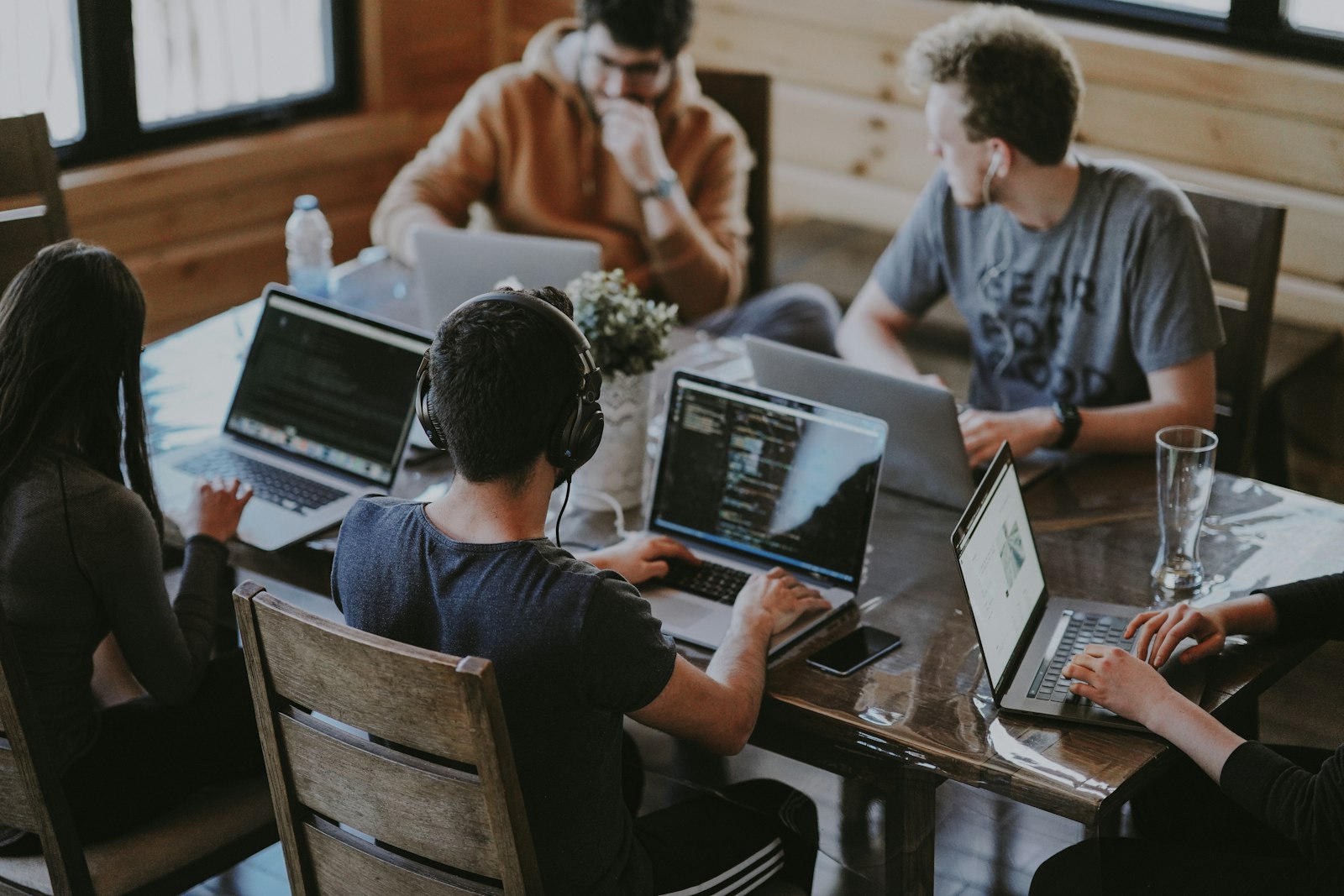 Software development team collaborating in a modern workspace